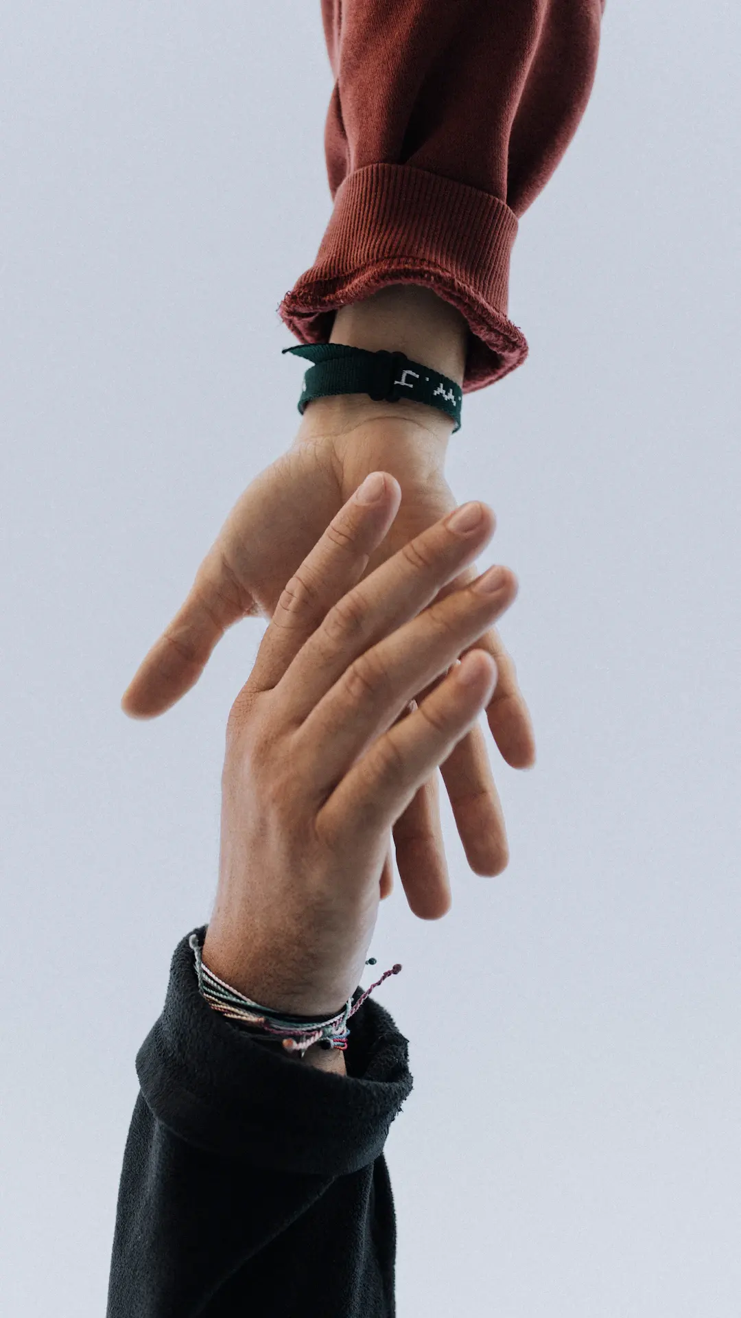 view of two persons hands